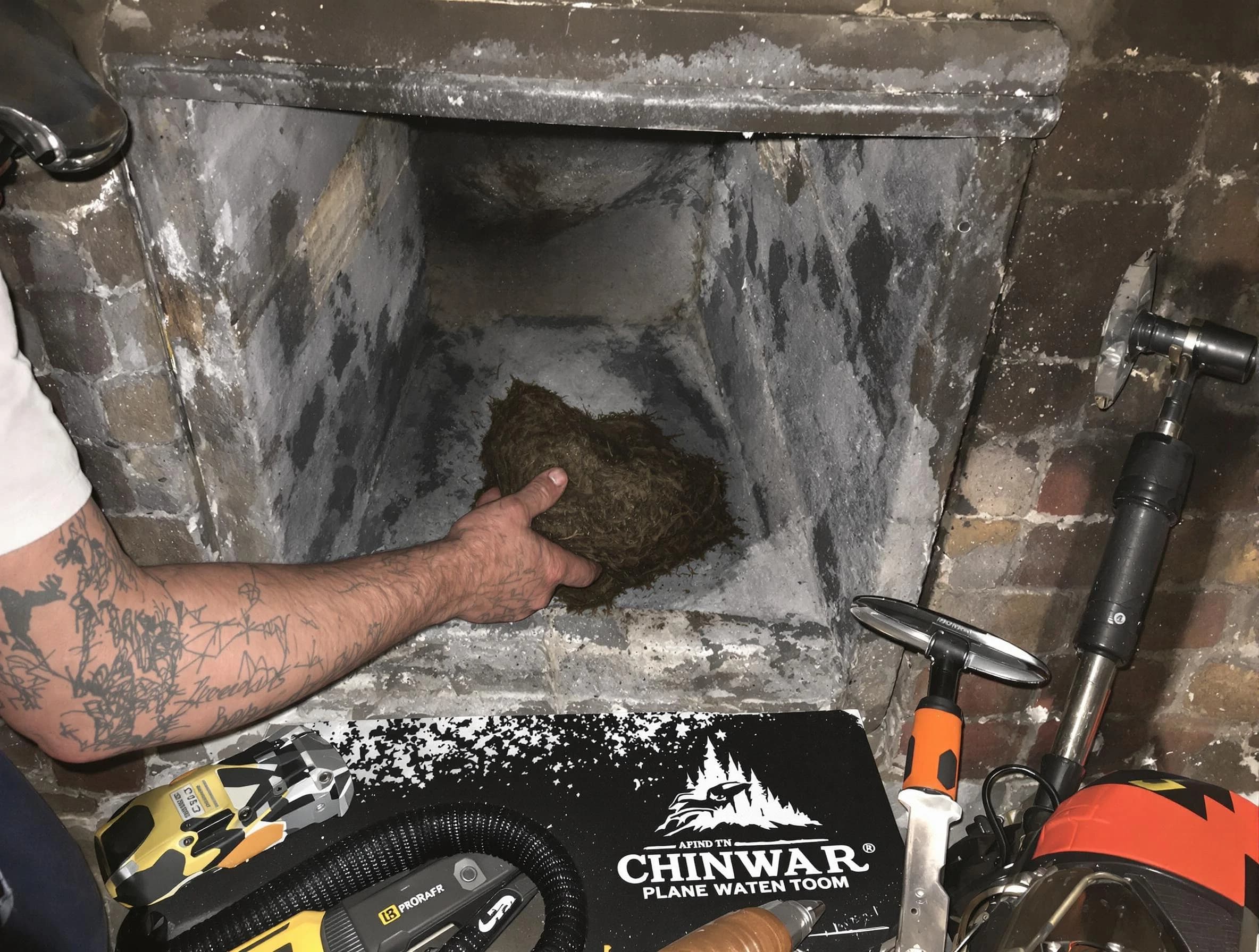 Alpine Chimney Sweep safely removing debris and screening chimney in Alpine, UT