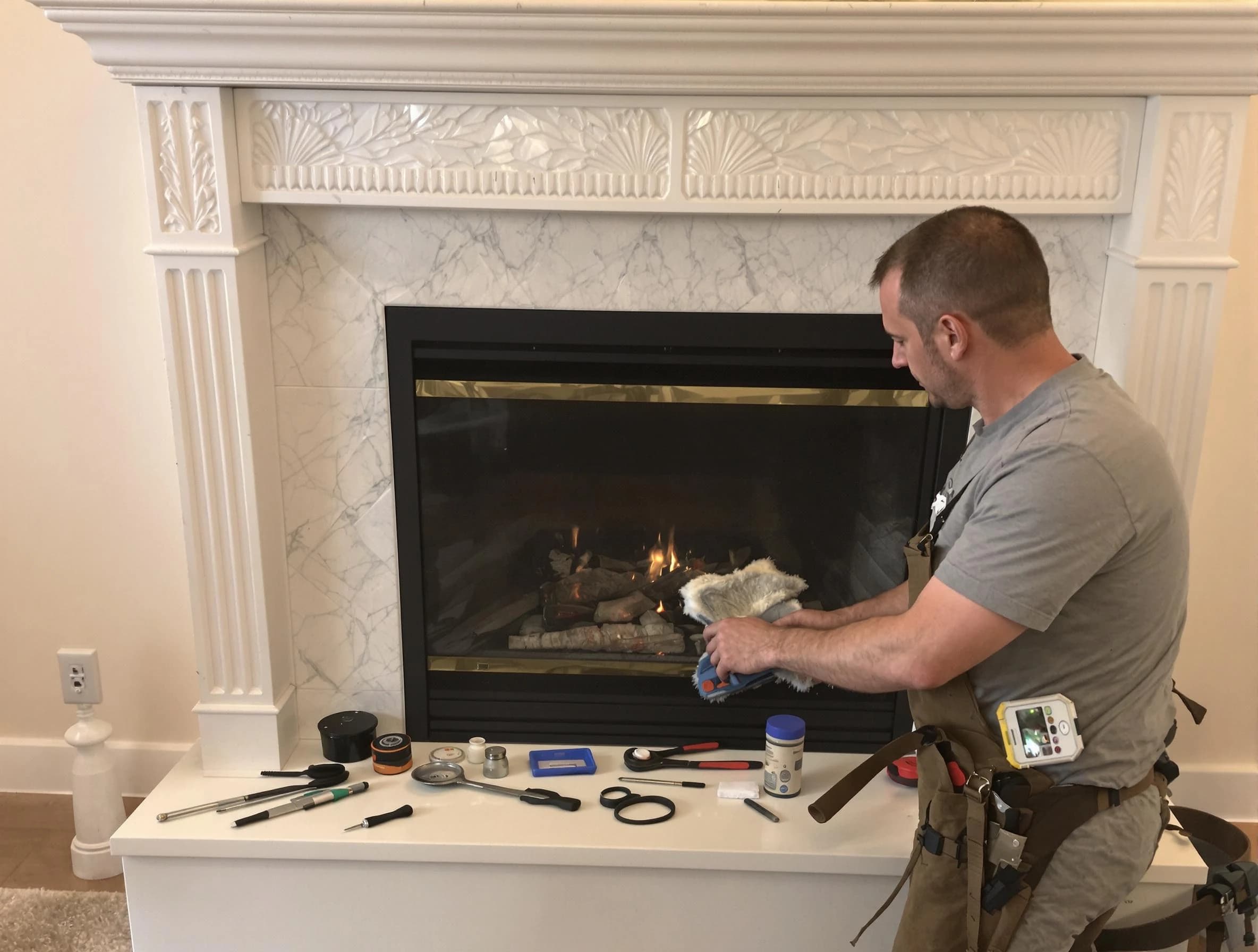 Alpine Chimney Sweep performing fireplace maintenance in Alpine, UT